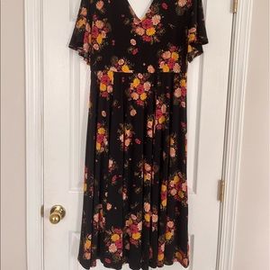 Torrid floral v-neck dress. Midi length. Super stretchy and flowy but not sheer!